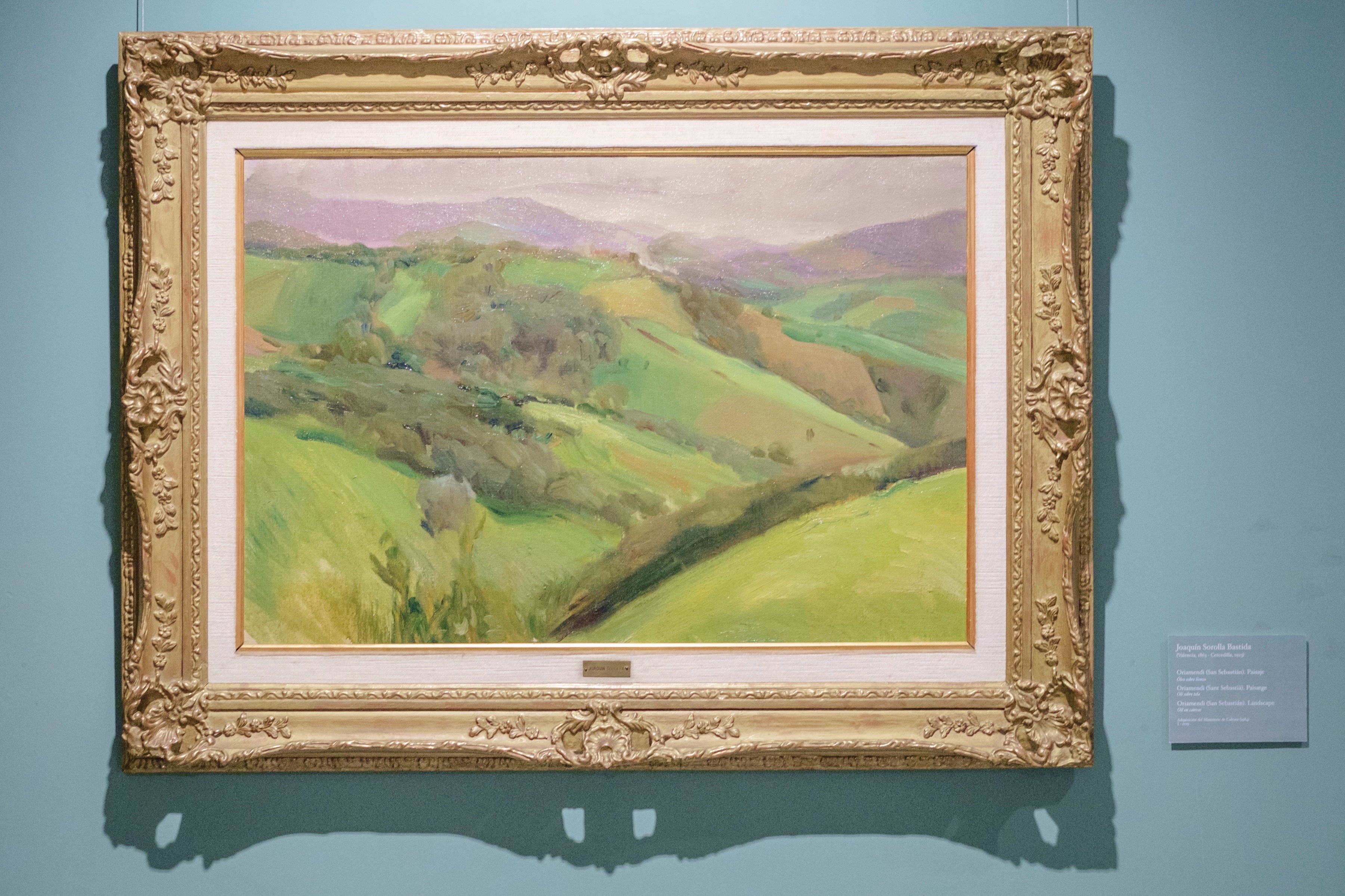 Framed landscape painting displayed in the museum