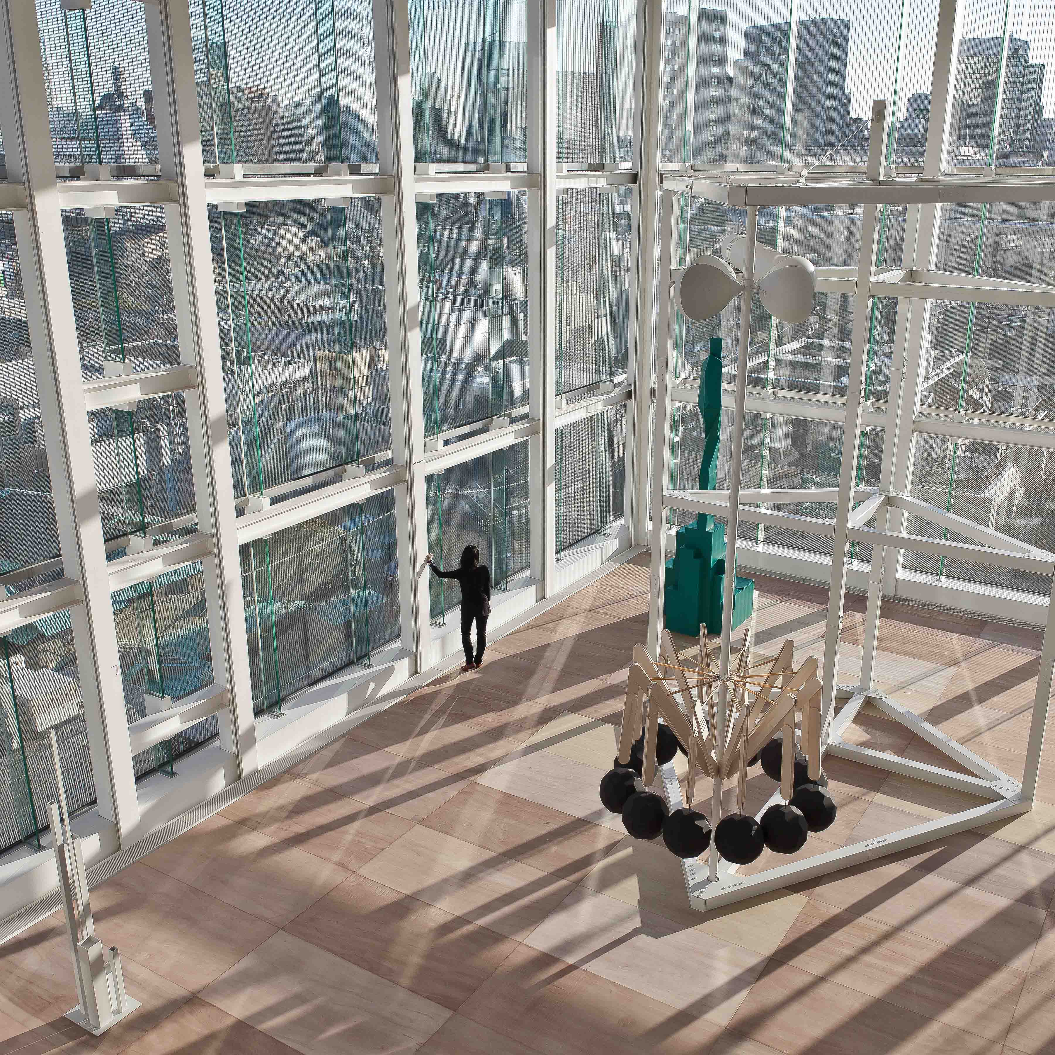 Elevated view of the Free Fall installation inside Espace Louis Vuitton Tokyo
